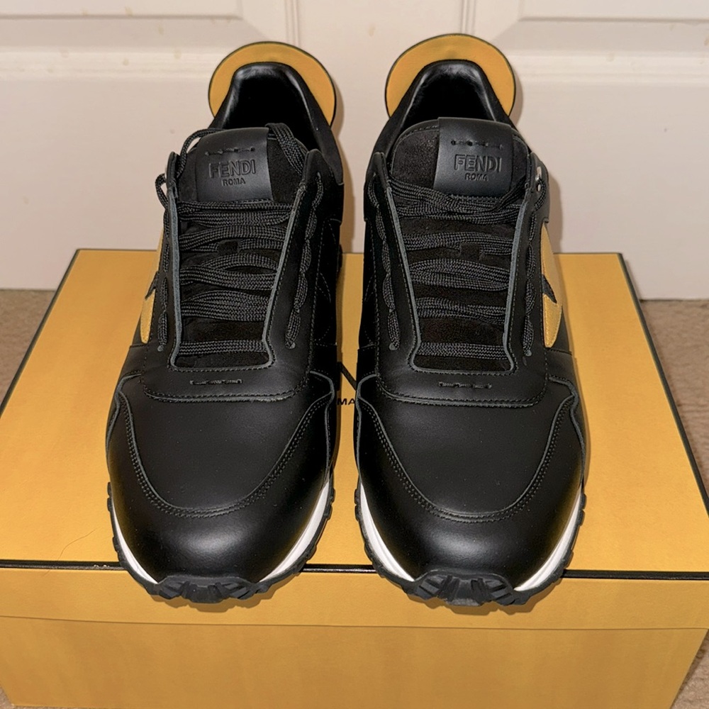 Mens Fendi sneakers, size 9.5 US. Gently worn a few times. Just like new.